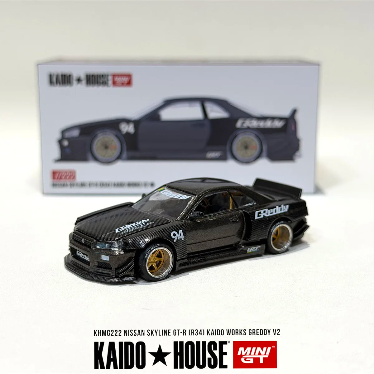 Mini GT x Kaido House 1:64 Nissan Skyline GT-R R34 Kaido Works Greddy V2 Full Carbon Diecast Model Car Item#KHMG222 In Stock