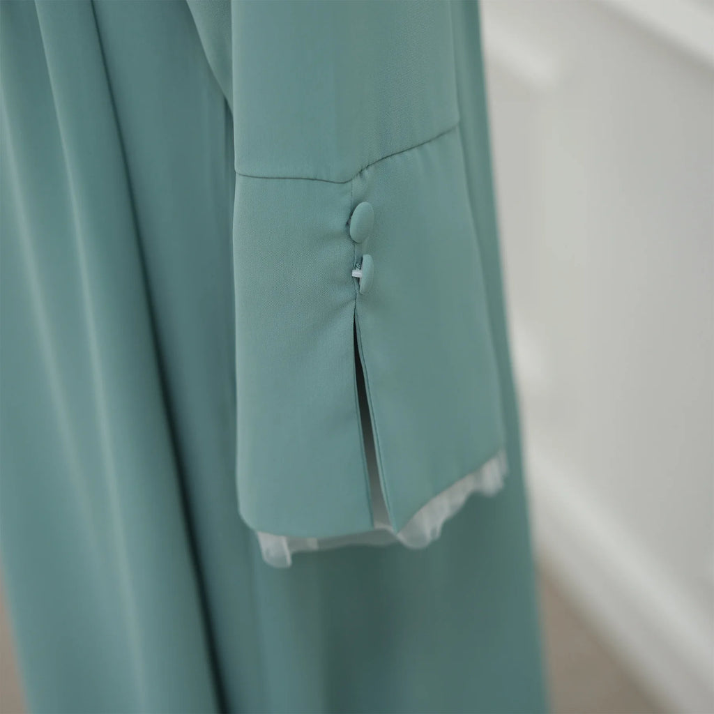 2025 Ramadan Bescheidene Muslimische Damenkleidung Elegantes Arabisches Abaya-Kleid mit Rückengürtel und Spitzenärmeln Islamisches Ausgestelltes Maxi-Gewand